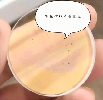 激光切割下保護(hù)鏡片出現(xiàn)黑點(diǎn)/燒點(diǎn)、油污/灰塵、水份是什么原因？